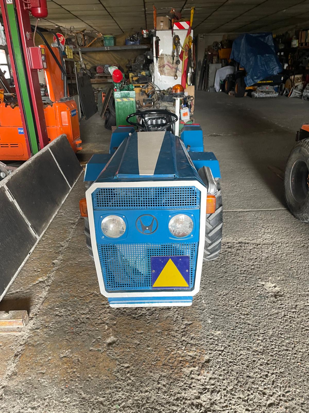 Pack tractor EBRO A30L 4x4 restaurado + cultivador 5 brazos